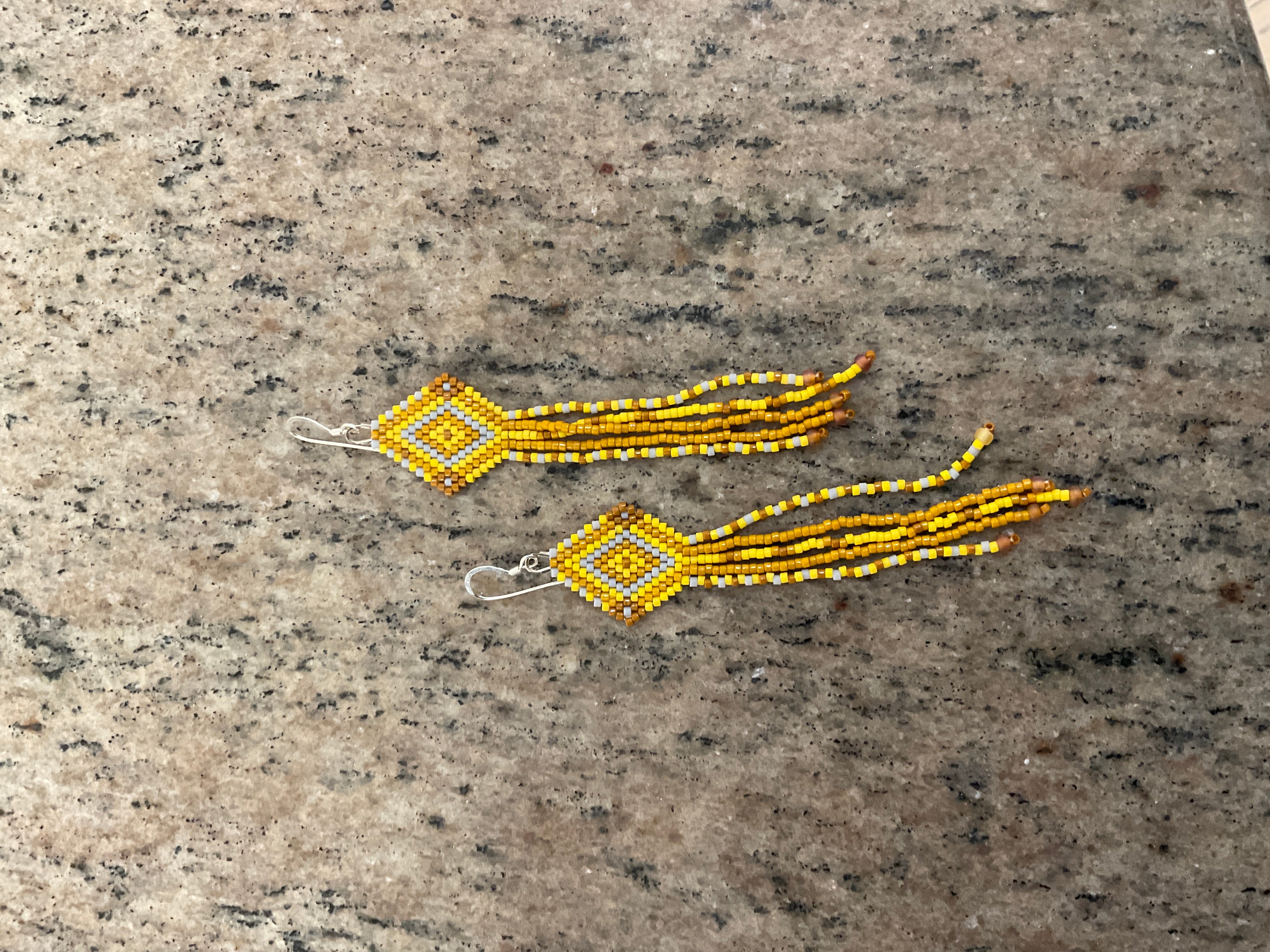 #72B yellow diamond earrings